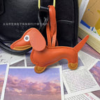 Orange dachshund pendant