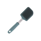 Dark green cleaning brush