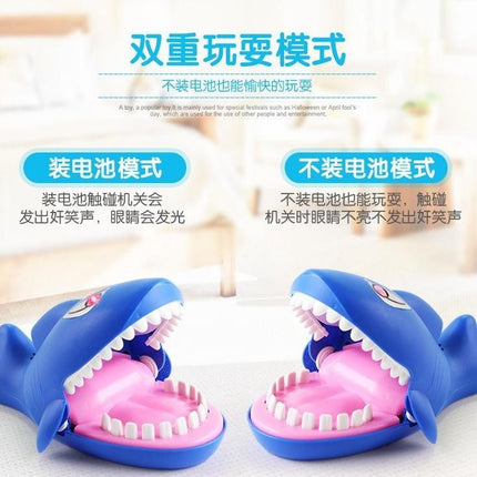 Shark toy press the teeth and mouth will move and bite the soft teeth big white shark trick the whole person new strange children's toy