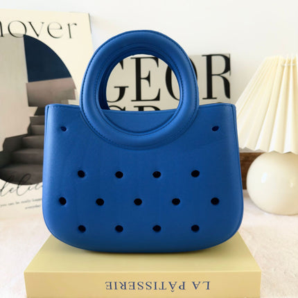 Cross-border new ladies handbag cartoon love fashion round travel storage bag eva hole bag beach bag