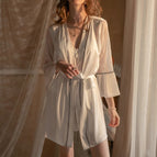 White [single robe] does not include suspenders / S