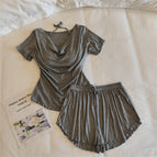 33027.2 # (with fixed chest pad) short sleeves + shorts, milky light gray / M