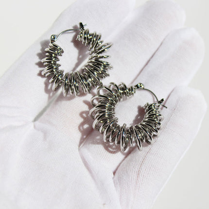 Brass gold plated European and American personality spiral Hollow spring earrings winding line POHO big ear ring earrings 553