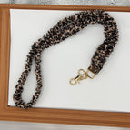 Dark coffee leopard print (bright gold)