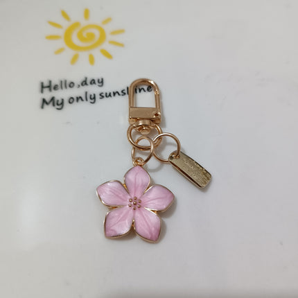 New Cross-border Ins Metal Daisy Keychain Niche Flower Stamen Bluetooth Headset Protective Cover Accessories
