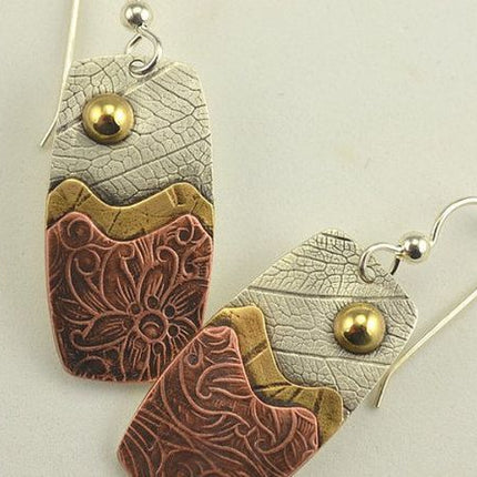 Hesheng new independent station jewelry retro ethnic style wave pattern carved earrings distressed leaf pattern European and American ear