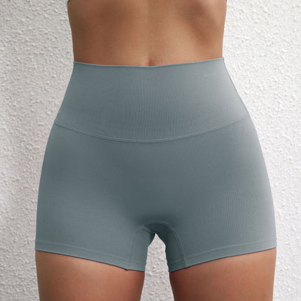 Summer solid color European and American women's high waist hip lifting peach sports shorts tight stretch fitness three pants can be worn outside