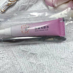 Single shot of small glue + small tweezers (no eyelashes)
