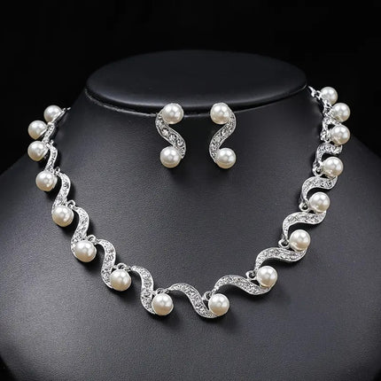 Factory Direct batch cross-border European and American Foreign trade new S-shaped alloy pearl necklace earrings Women's Light luxury niche clavicle chain