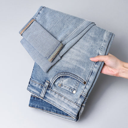 European style light luxury fashion brand men's slim fit skinny Denim trousers Foreign single European casual micro elastic slimming light blue pants