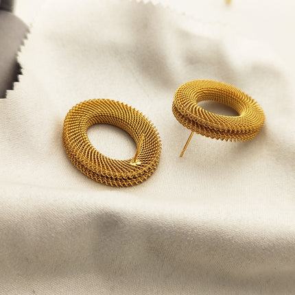 New European and American personality geometric circle earrings metal sense line heavy woven simple stud earrings temperament earrings