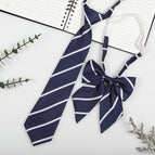 Navy blue stripes (tie + collar flower)