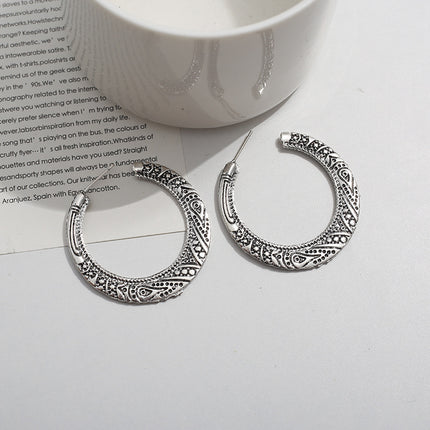 European and American exaggerated retro big earrings simple temperament popular geometric alloy Xizang pattern carved C- shaped ear studs earrings for women