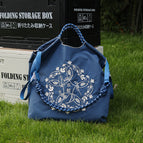Light blue (excluding shoulder strap) / Medium