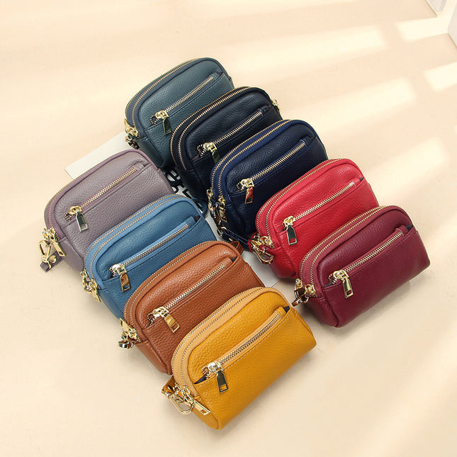 New first layer cowhide hand-held small wallet handbag simple Mini small three zipper leather coin purse for women