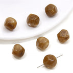 5 p/bag / Irregularly cut beads 12x 12mm aperture about 1mm brown