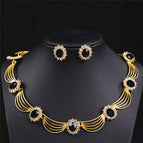 18k gold black necklace + earring pin
