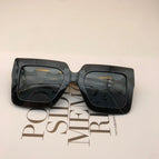 981 black frame gray film
