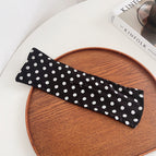 Black polka dots