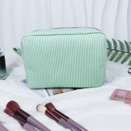 etsy hot selling seersucker embroidered striped cosmetic bag for travel portable toilet storage cosmetic bag