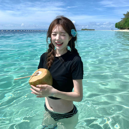 Source manufacturers new online red explosions black meat-covered striped bikini sexy hot girl swimsuit women bubble hot spring