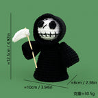 Black headed hand holding scythe death