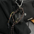 small black woven bag