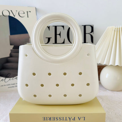 Cross-border new ladies handbag cartoon love fashion round travel storage bag eva hole bag beach bag