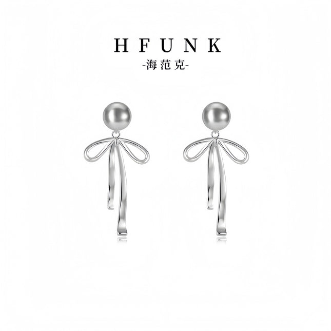 925 Silver Needle Korean and Japanese Summer Faux Pearl Bowknot Earrings Simple French Style Versatile 2026 New Women's Earrings