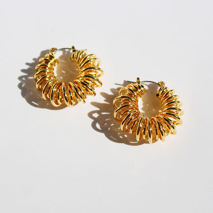 Brass gold plated European and American personality spiral Hollow spring earrings winding line POHO big ear ring earrings 553