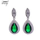 Green and white earrings (ear pin style)