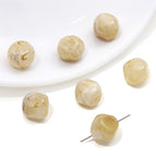5 p/bag / Irregularly cut beads 12x 12mm aperture about 1mm beige