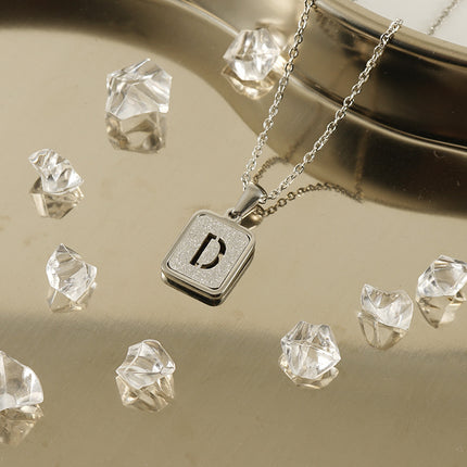 Cross-border European and American Stainless Steel Sand Pressing Letter Pendant Women's Color-free Square Titanium Steel Hollow English Letter Necklace Women
