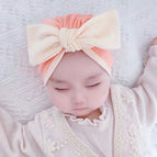 13 orange-bow / One size fits all (0-12 months)