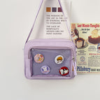 Purple with badge
