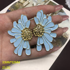 FM899 light blue stud earrings