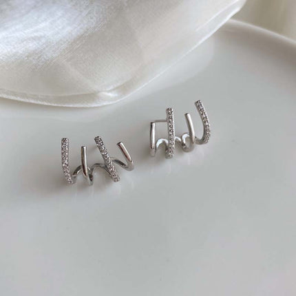 European and American fashion retro zircon four-claw earrings high-grade temperament simple zircon female silver pin earrings flash earrings