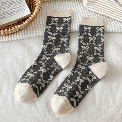 Zhuji socks women's autumn and winter retro trend women's socks bow printed socks warm cold-resistant pile socks wholesale