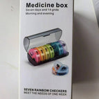 With color box packaging and transparent black + colorful grids pill box
