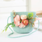 Pink artificial flower bunch with green