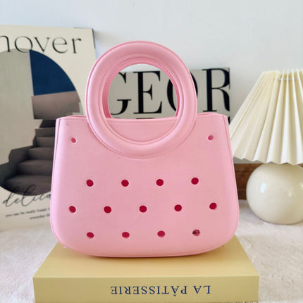 Cross-border new ladies handbag cartoon love fashion round travel storage bag eva hole bag beach bag