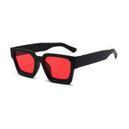 Sand black red flakes