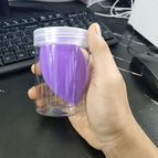 Dark purple beveled giant beauty egg in cylinder box