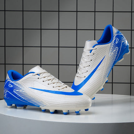 Cross-border foreign trade football shoes men's broken nails primary school students teenagers mandarin duck couple artificial grass spikes training wholesale