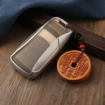 Year of the Snake new peach wood male and female brave peace buckle mountain ghost spending key chain pendant fortune transfer car pendant