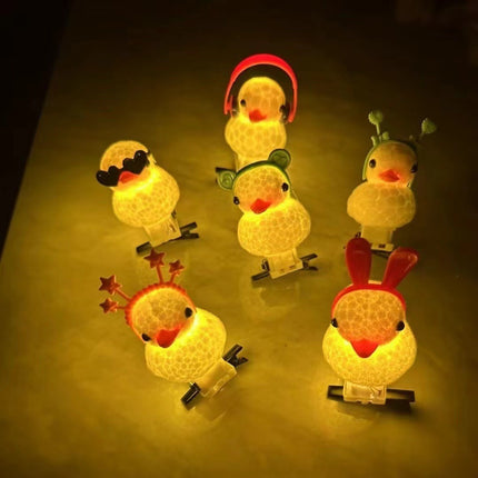 Selling cute magic luminous yellow duck hairpin super cute cartoon flash hairpin female headdress cross-border push night market