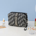 Octagonal bag with hand strap