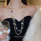 680 white beads black and white clover