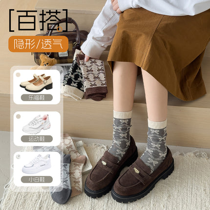 Zhuji socks women's autumn and winter retro trend women's socks bow printed socks warm cold-resistant pile socks wholesale