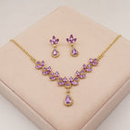 (necklace + earrings) gold bottom purple
